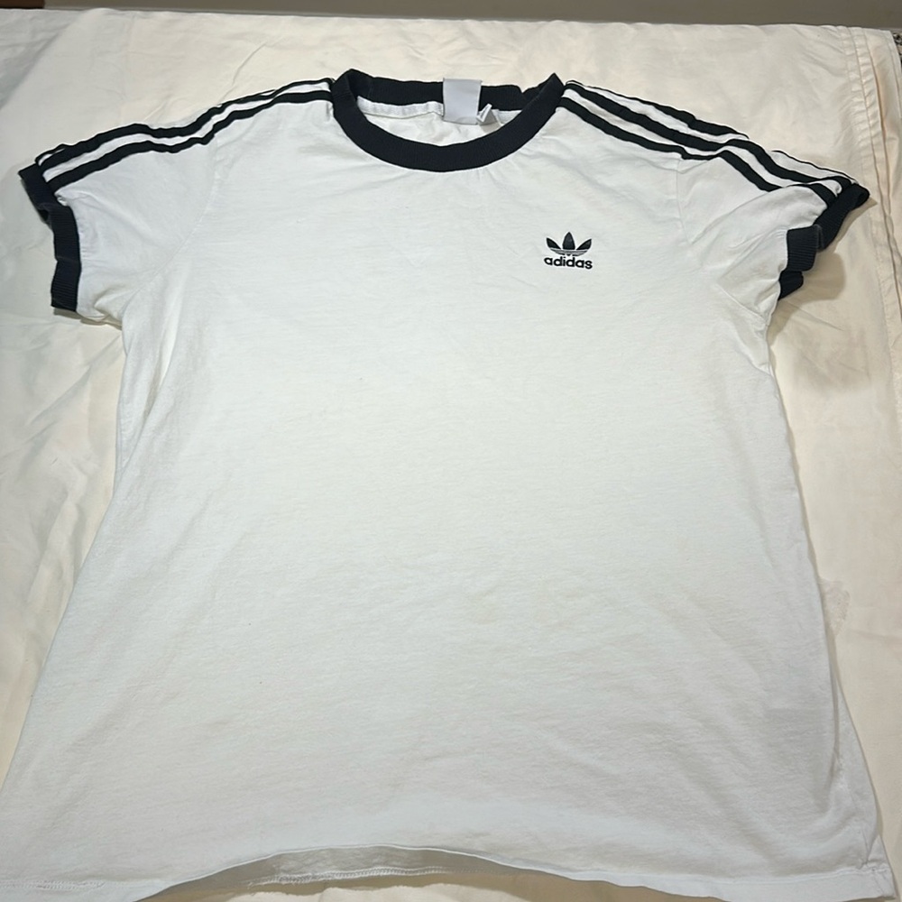 Adidas T-shirt, young men’s size Medium.